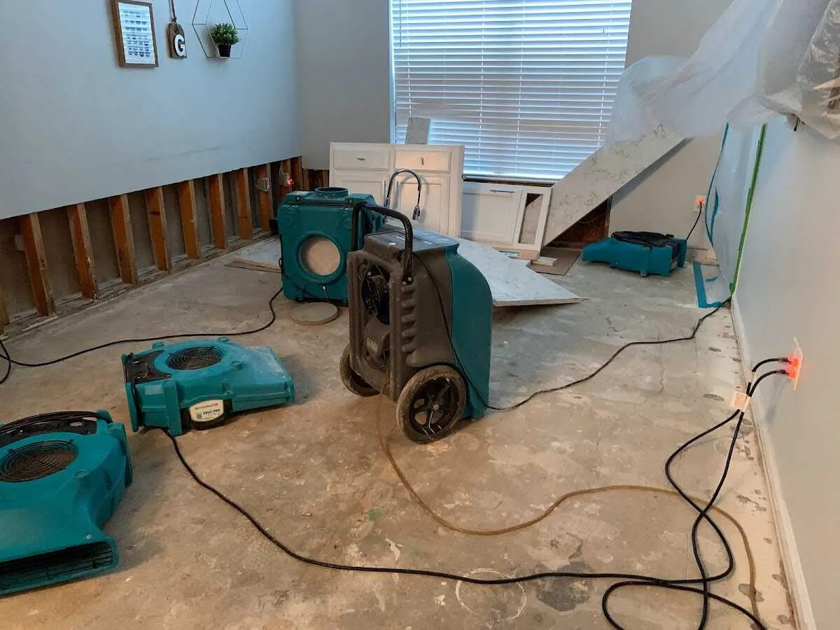 Dehumidifier in flood-cut room for Water Damage Restoration in Jesup
